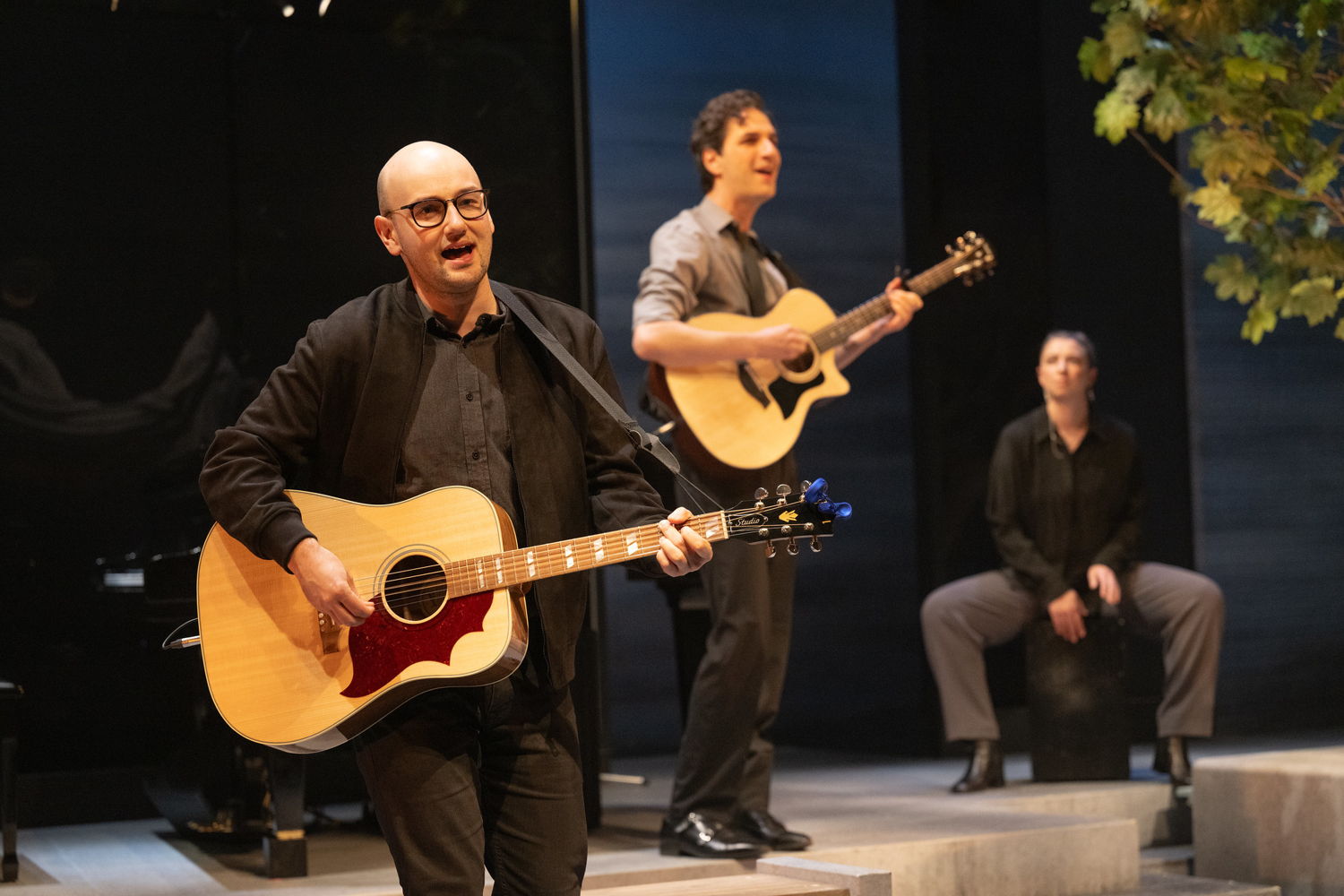 Anton Lipovetsky, Jonathan Gould, and Hannah Mazurek in I Think I’m Fallin’: The Songs of Joni Mitchell / Photo by David Cooper / Cory Sincennes - Set and Costume Designer / Alan Brodie - Lighting Designer / Keith Houghton - Assistant Lighting Designer