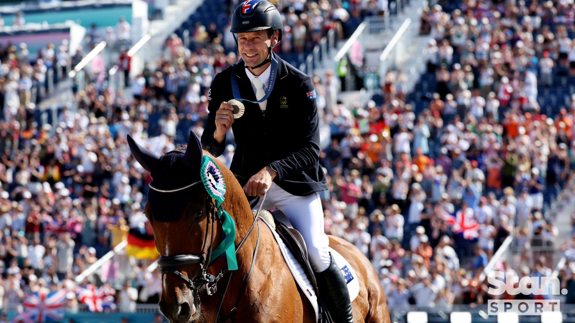 Australia's Chris Burton won Individual Eventing Silver aboard Shadow Man. Australia's Chris Burton won Individual Eventing Silver aboard Shadow Man.