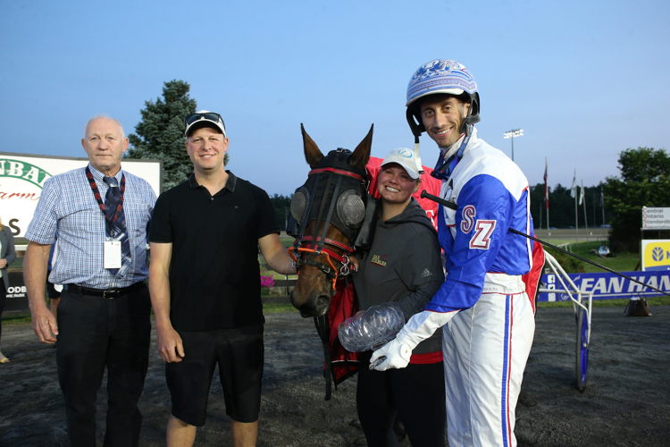 Connections of Southwind Coors celebrate winning the Goodtimes Final at Woodbine Mohawk Park on June 17, 2023 (New Image Media)
