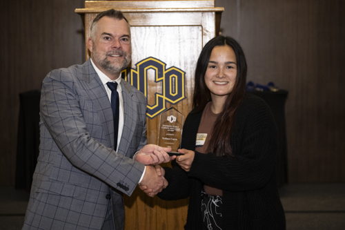 Sydnee Corro and Bryan Duke, Ph.D., dean of the UCO College of Education and Professional Studies