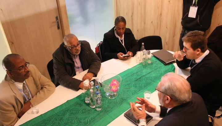 OECS delegates Crispin d'Auvergne, Dr. Didacus Jules and Norma Cherry - Fevrier in talks with their counterparts Mr. James Ellsmoor of Solar Head of State (SHOS) and Mr. Francois Martel Secretary General of the Pacific Island Development Forum (PIDF) 