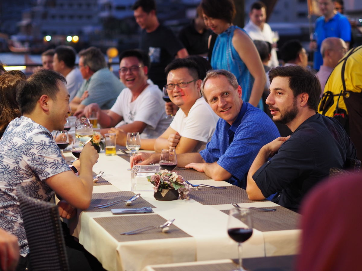 Senior Managers with Jebsen & Jessen Group Chairman Heinrich Jessen at the riverboat dinner in Bangkok, Thailand.