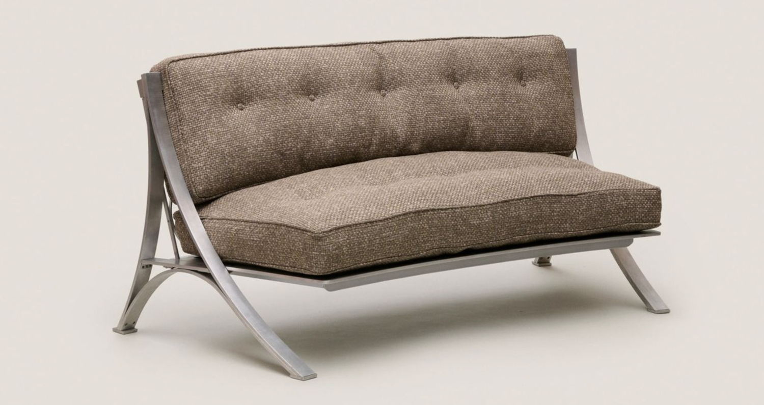Aluminium curved settee, 1953 by Paul László from Galerie Eric Philippe at Design Miami Basel 2024 (Image courtesy of Galerie Eric Philippe)