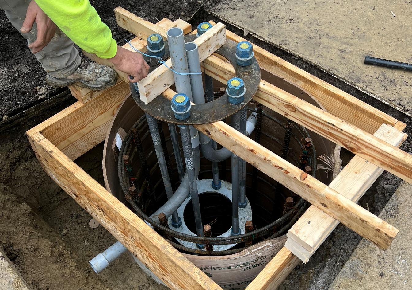 PRT subcontractor installing signal foundation for BRT project PRT subcontractor installing signal foundation for BRT project