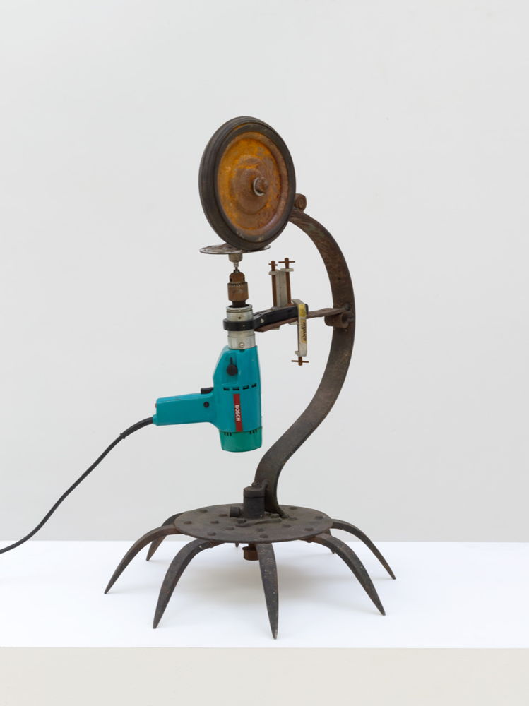 JEAN TINGUELY Untitled (Briquolage), ca 1974 steel, Bosch electric sander, vise, wheel 75 x 49 x 49 cm. Courtesy Tim Van Laere Gallery, Antwerp-Rome