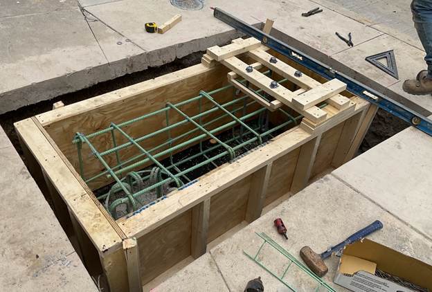 New foundation recently placed for pedestrian lighting at Fifth Avenue and Washington Place