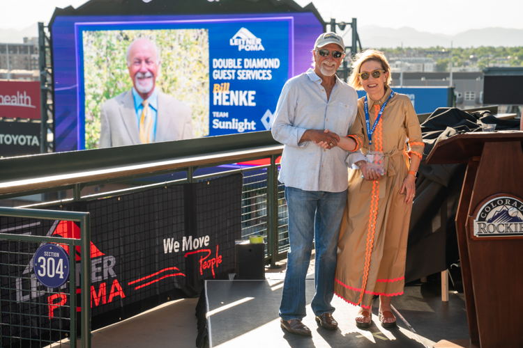 Guest Services Award winner Bill Henke (L) and CSCUSA President and CEO Melanie Mills (R)