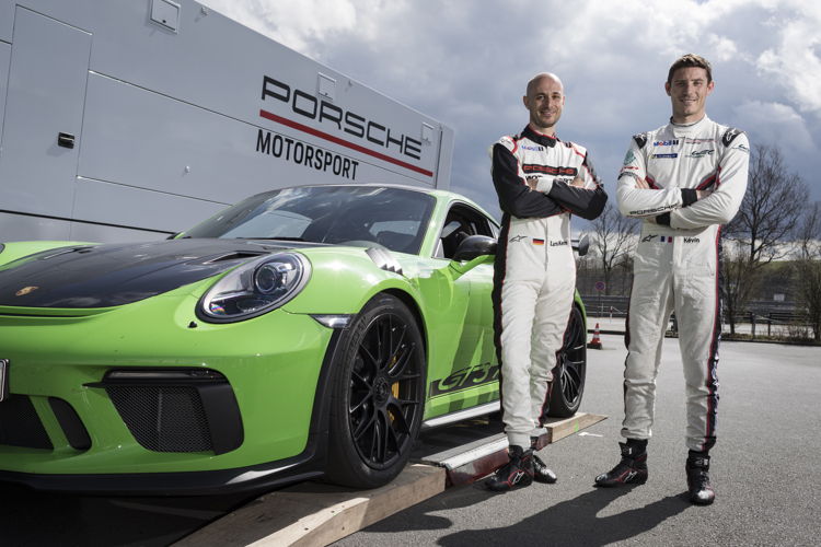 L-R: Lars Kern (Porsche test driver) and Kévin Estre (Porsche factory driver) after the hot lap at the Nuerburgring Nordschleife.