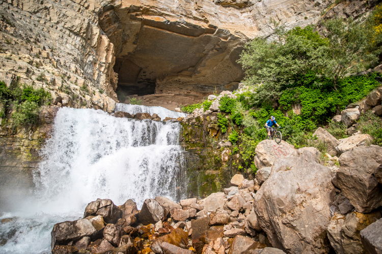 Christophe Akiki/Red Bull Content Pool - Kenny Belaey performs during filming Border to Border at Afqa waterfall, Lebanon