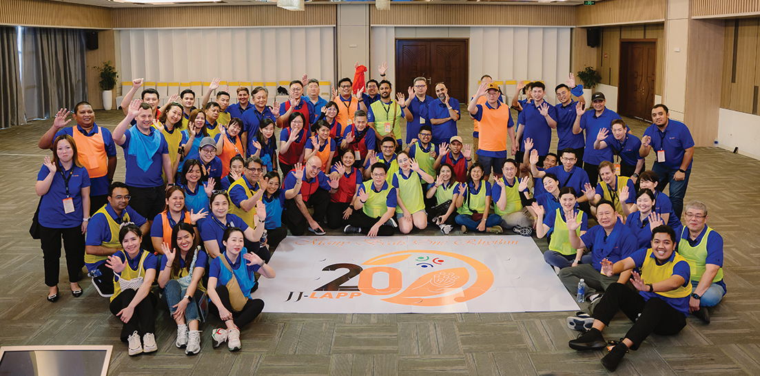 Team members gather for a group photo after completing team building activities.