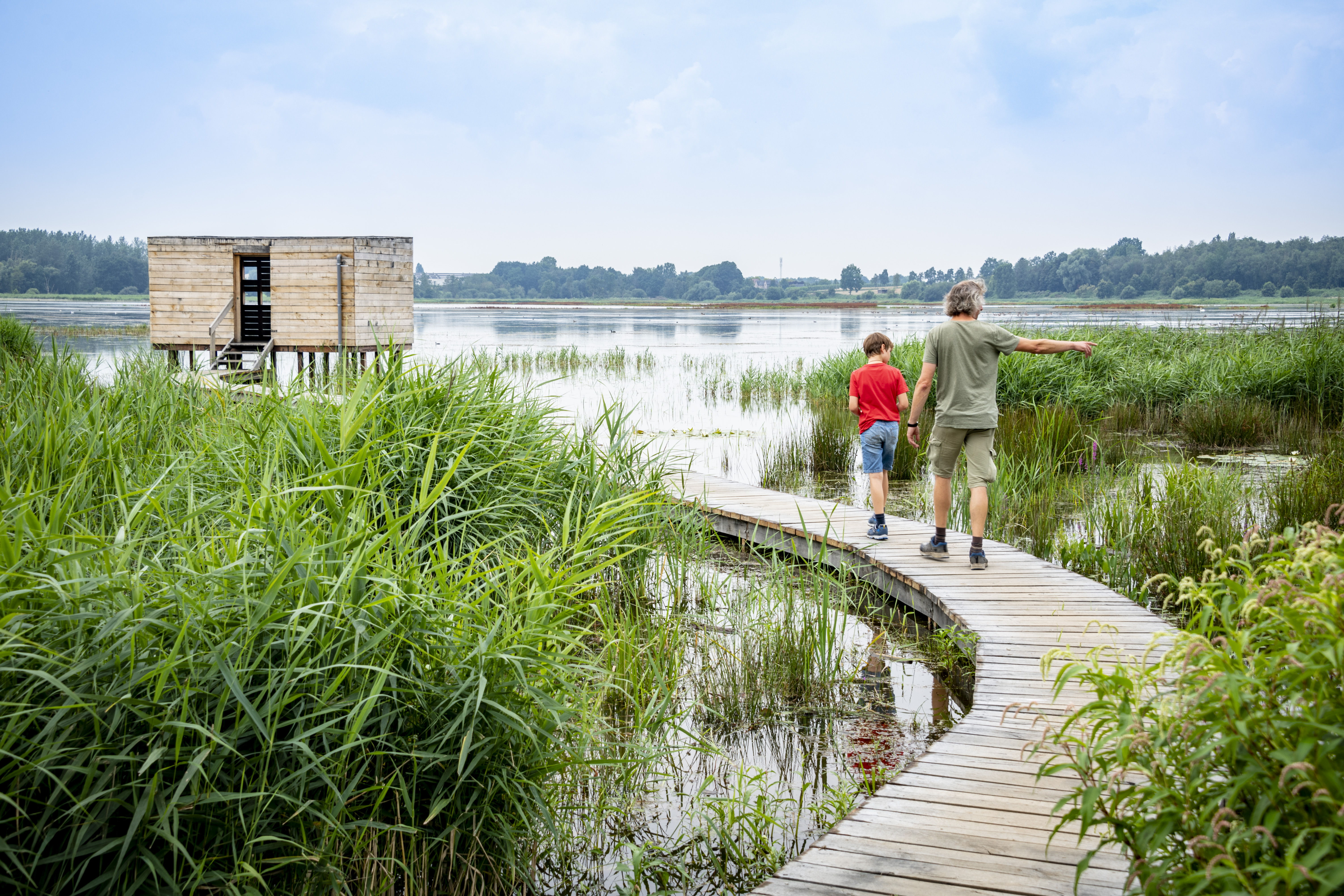 Wandelen rond het grootste binnenmeer van Vlaanderen is de favoriete activiteit in Het Vinne (copyright: Lander Loeckx)