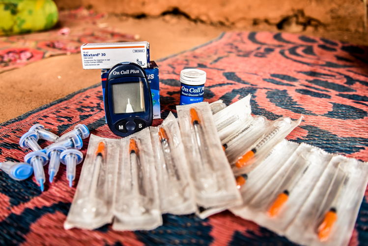 A treatment kit for patients with type 1 diabetes including a glucometer and glucometer strips, needles, insulin. 
Copyright: Paul Odongo/MSF