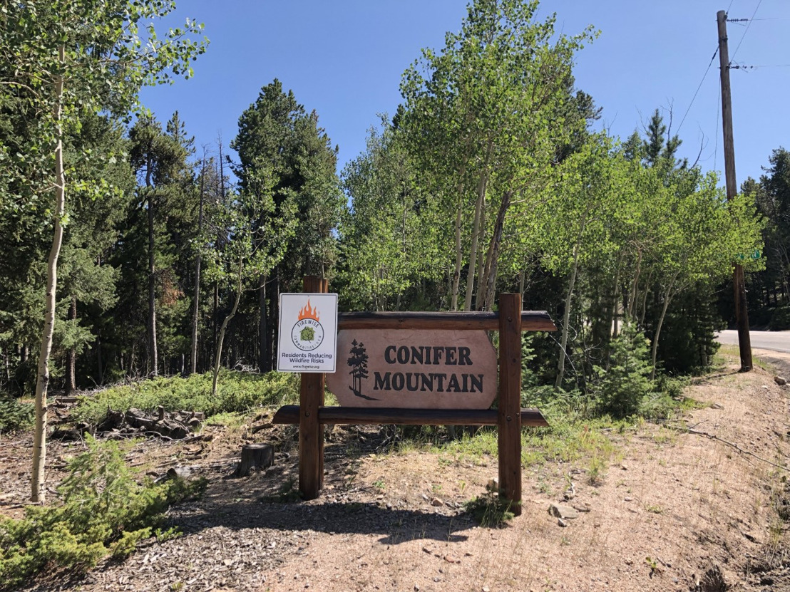 As fire season ignites, Conifer Mountain Homeowners Association community is certified as a Firewise USA® Community