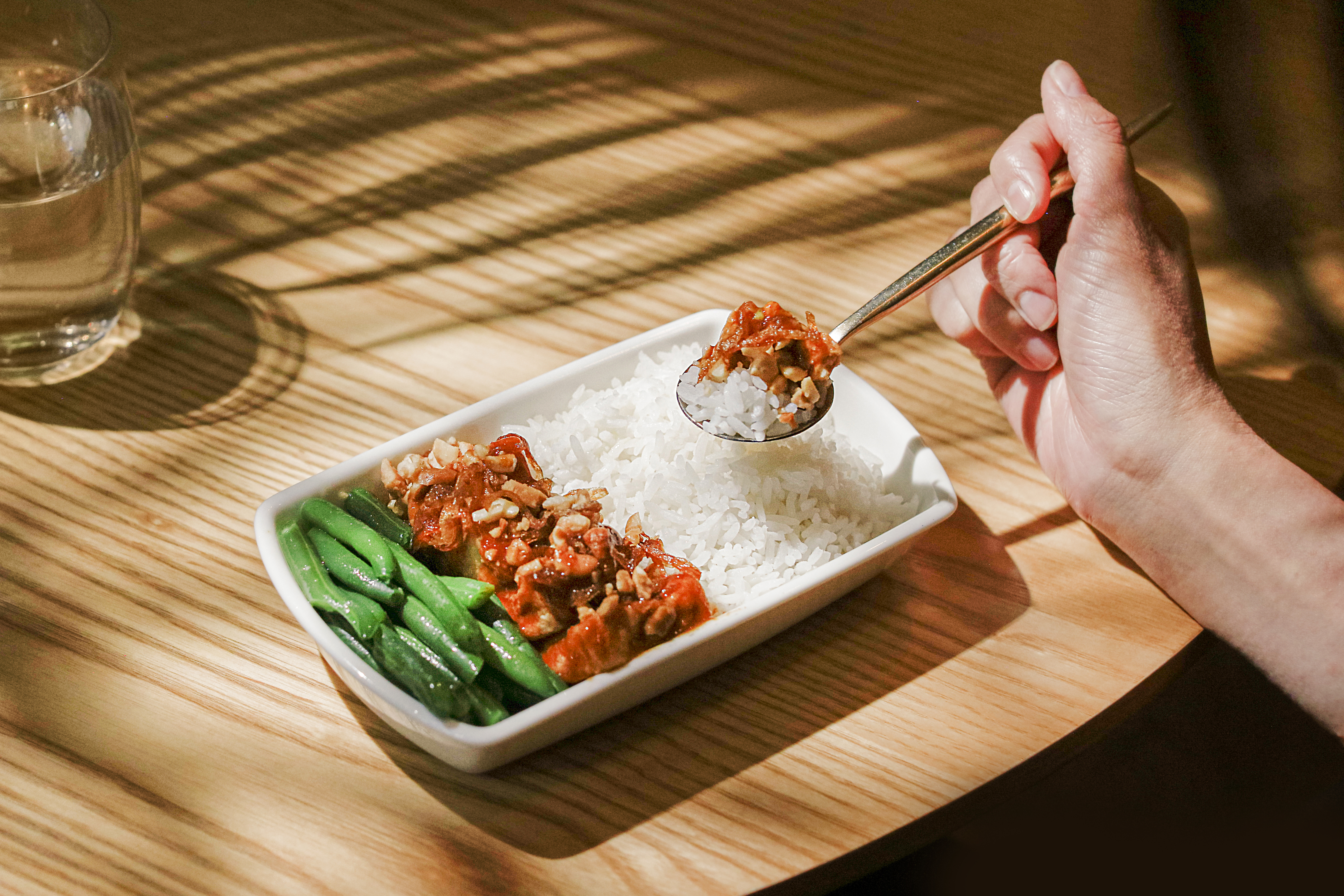 Panang dry curry tofu with cashews and coconut rice