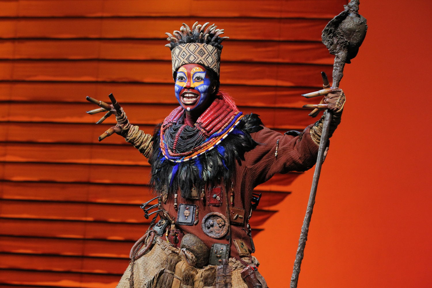 Buyi Zama as “Rafiki” in THE LION KING North American Tour.  ©Disney.  Photo by Joan Marcus.