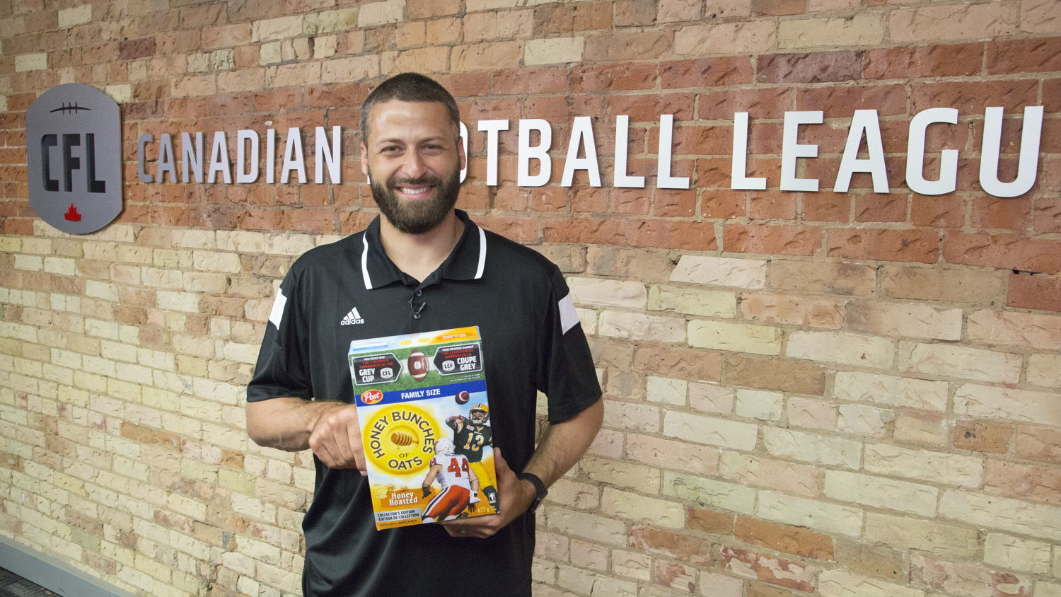 Mike Reilly with his Collector's Edition Post CFL cereal box 