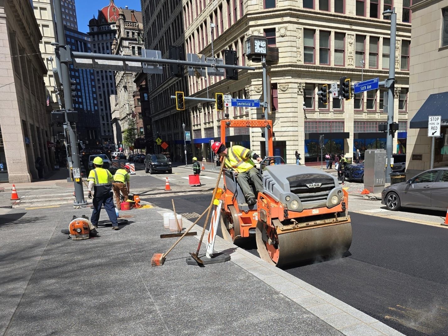 New asphalt recently placed on Sixth Avenue at Smithfield Street New asphalt recently placed on Sixth Avenue at Smithfield Street