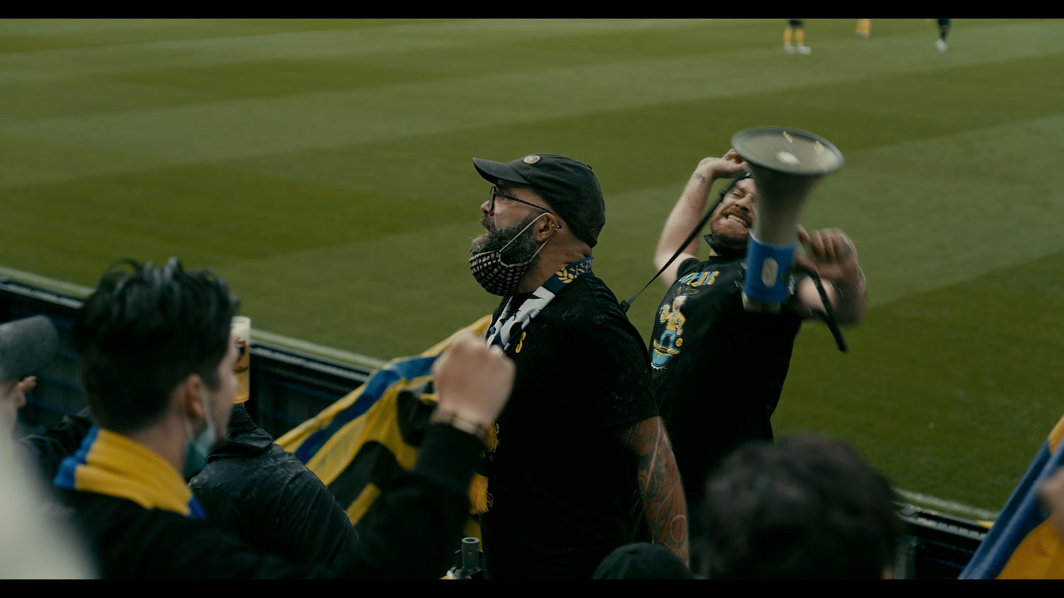 supporter Dylan (met megafoon)