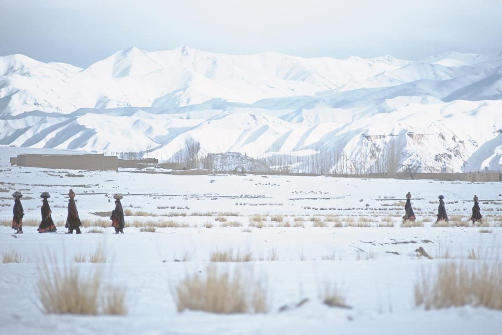Landscape in winter with women on their way to the river to get water, Bamiyan Valley, Afghanistan. 1968. AKG1982202 Landscape in winter with women on their way to the river to get water, Bamiyan Valley, Afghanistan. 1968. AKG1982202