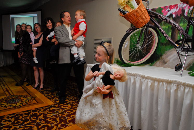 A NICU gradute, Beth Harrison greets guests at the Celebration of Miracles.