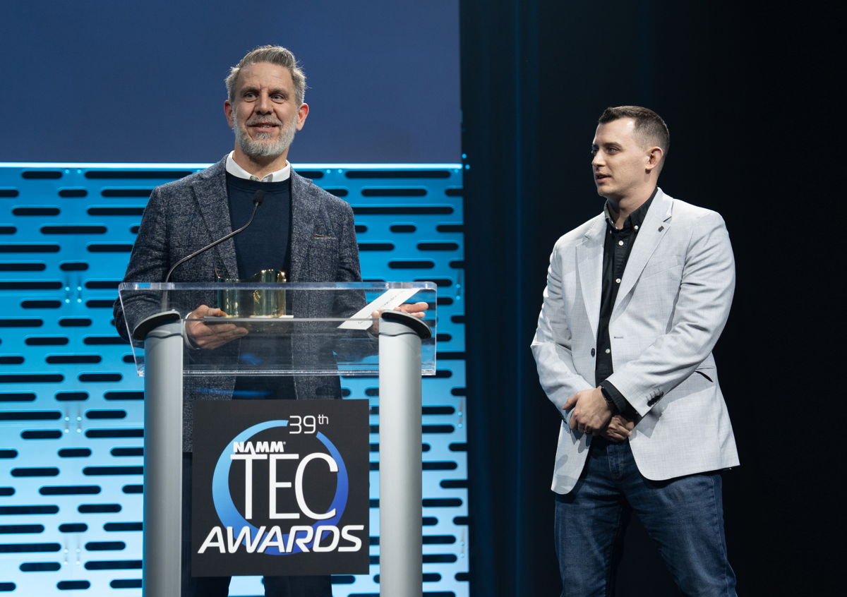 Neumann CEO Ralf Oehl and Head of Sales and Business Development, Jonathan Ruest accept the TEC Award for the M 49 V in the Microphones – Recording category.