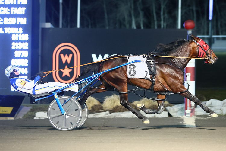 Nautical Hanover and James MacDonald winning the New Holland Pacing Series Final. (New Image Media)