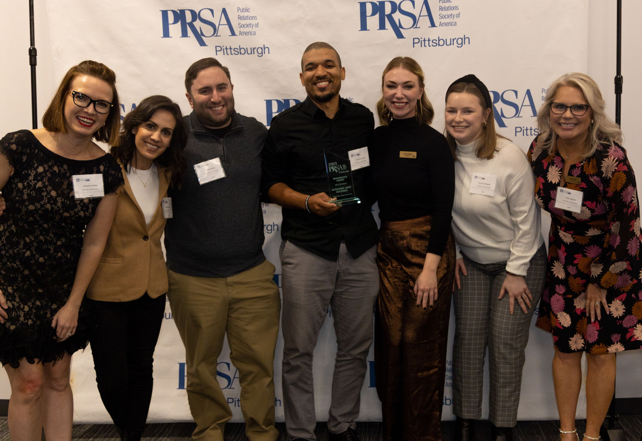 Members of Duquesne Light Company's corporate communications team accepted the "Best in Show" award during the 2023 PRSA Pittsburgh Renaissance Awards held a Carnegie Science Center on Jan. 26. Pictured from left: Christine Waller, Ashley Macik, Nick Ruffolo, Samson Horne, Kristen Wishon, Alyssa Battaglia and Hollie Geitner.