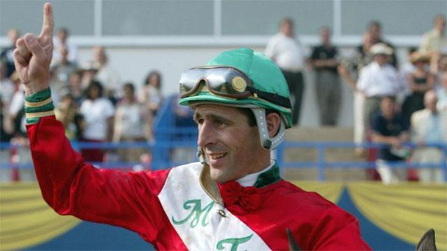 Steve Bahen celebrates his Queen's Plate win in 2002