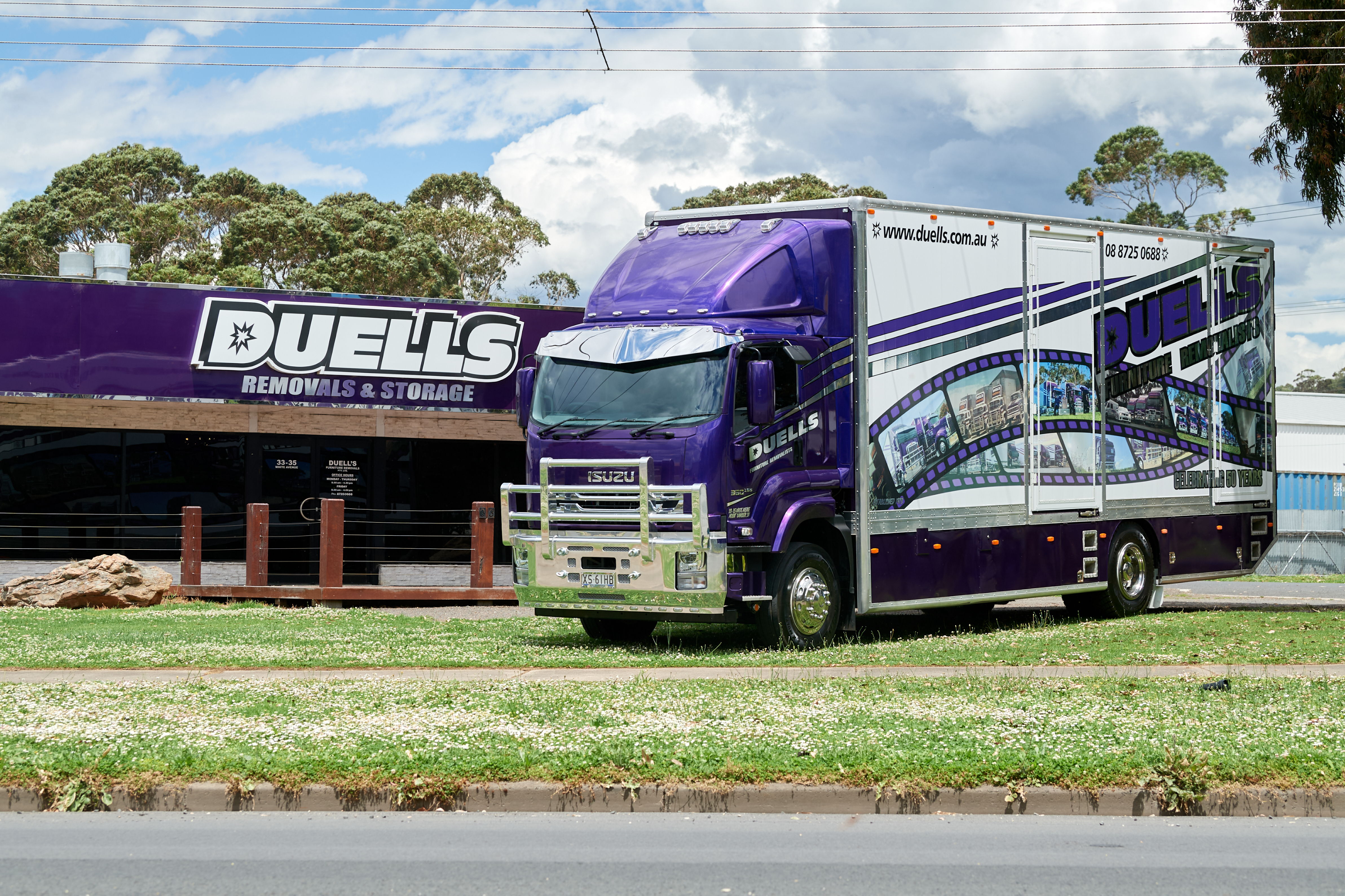 The distinctive purple colours of Duells Furniture Removalists
