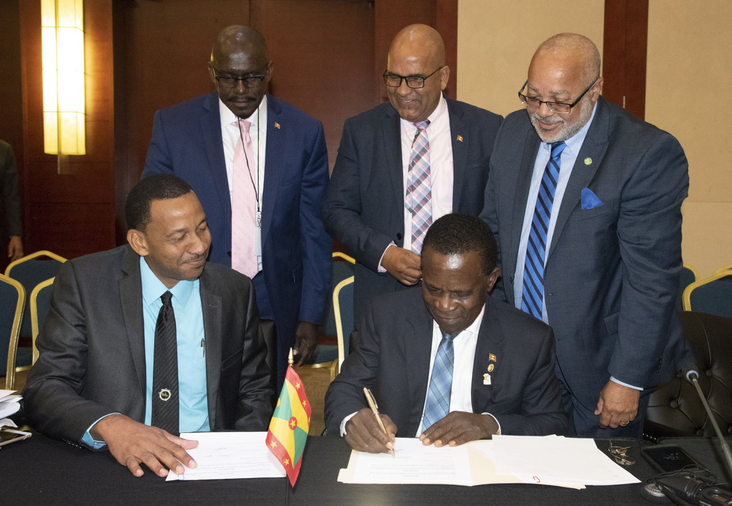Prime Minister of Grenada, Dr. the Rt. Hon. Keith Mitchell and Managing Director (Ag) of ECTEL, Mr. Andrew Millett, sign Protocol Amending the Treaty Establishing the Eastern Caribbean Telecommunications Authority.