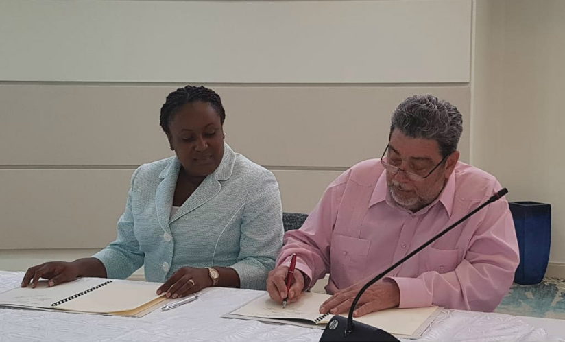 Incoming Chairman of the OECS Authority, Dr. Hon. Ralph Gonsalves, and Internal Auditor for the OECS Commission, Mrs. Mauricia Carr, sign Terms Of Reference for the OECS Audit Committee. Incoming Chairman of the OECS Authority, Dr. Hon. Ralph Gonsalves, and Internal Auditor for the OECS Commission, Mrs. Mauricia Carr, sign Terms Of Reference for the OECS Audit Committee.