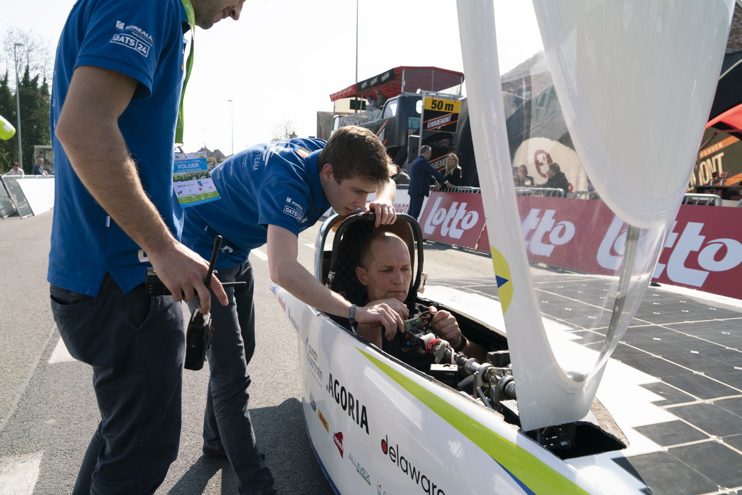 Belgian TV host Karl Vannieuwkerke trying out the solar car