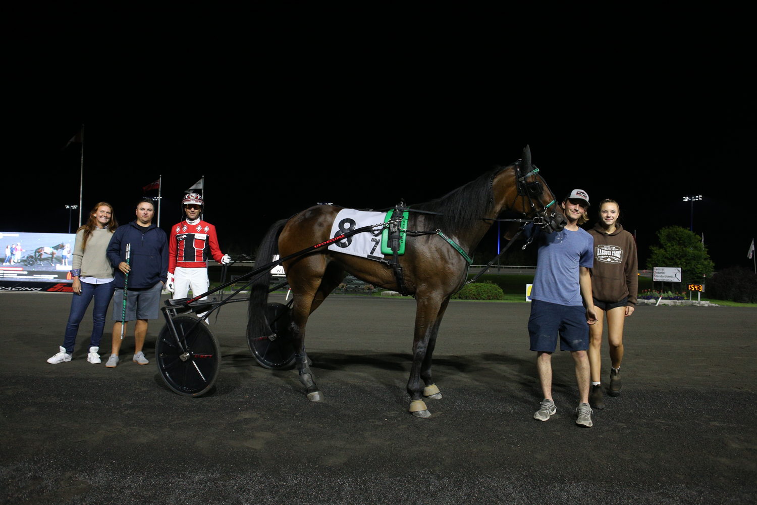 Tandem Hanover in the winner's circle for the second Peaceful Way Elimination on August 19, 2023 at Woodbine Mohawk Park (New Image Media)