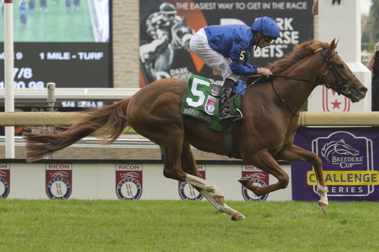 Modern Games and jockey William Buick winning the 2022 Ricoh Woodbine Mile (Michael Burns Photo) 