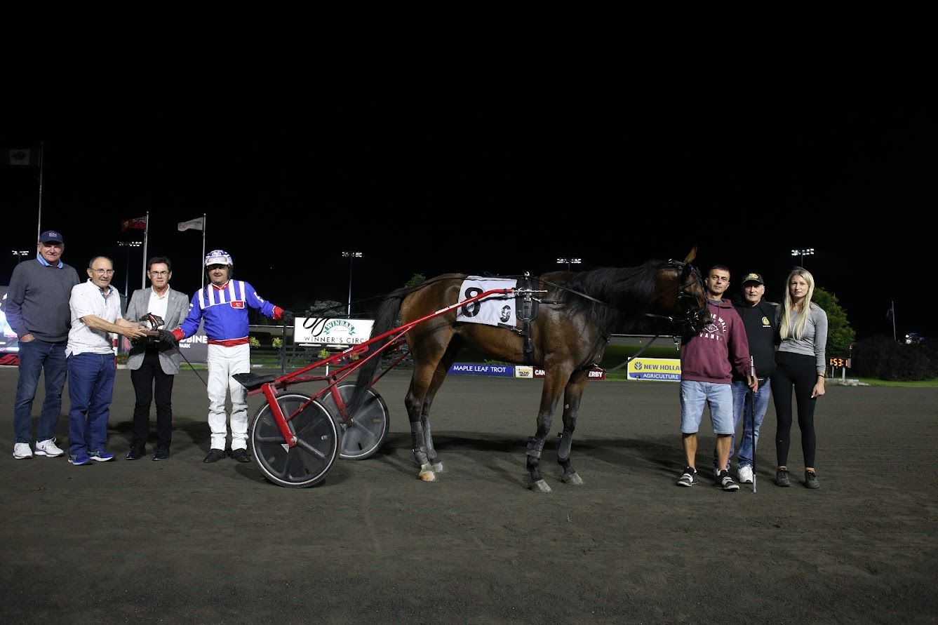 Gaines Hanover in the winner's circle for the Simcoe Stakes on September 2, 2023 at Woodbine Mohawk Park (New Image Media)