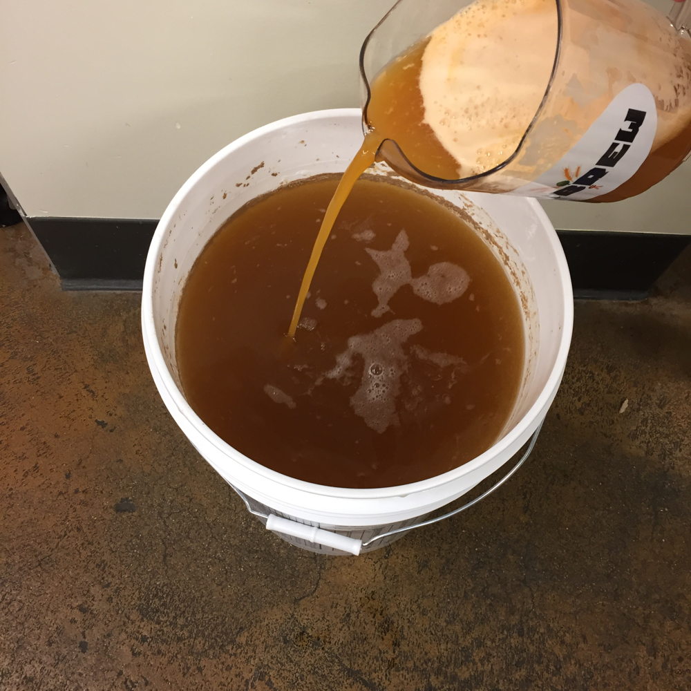 Pureed organic Hirakata Farms cantaloupe is added to the wort during the brewing process