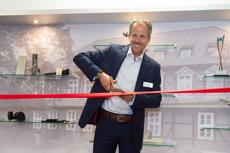 Sennheiser Co-CEO Andreas Sennheiser cuts the ribbon on the new Sennheiser Canada office.