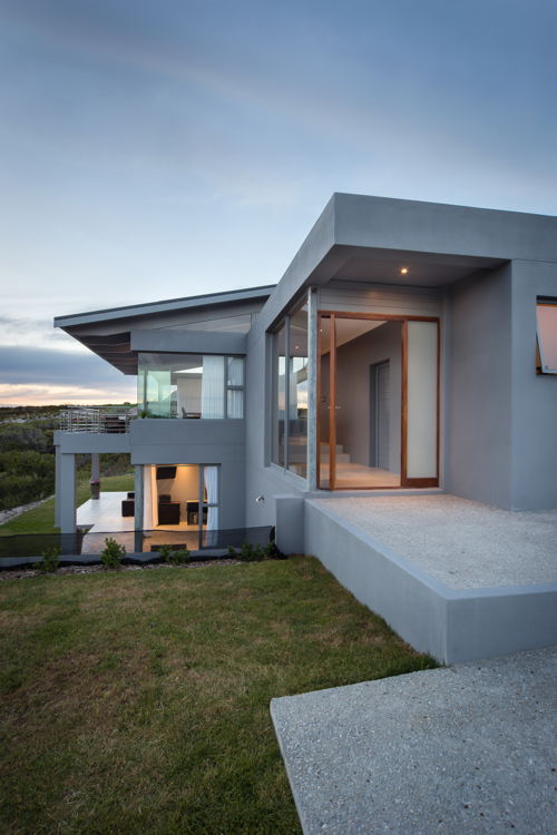 This brand new four bedroom, four bathroom Avenue Home at Chapman’s Bay Estate offers its occupants spacious and light-filled accommodation as well as spectacular views of the valley, mountains and ocean. The use of huge glass panels means that from the wind-protected, north courtyard, one is able to look right through the house to the southern views beyond.
