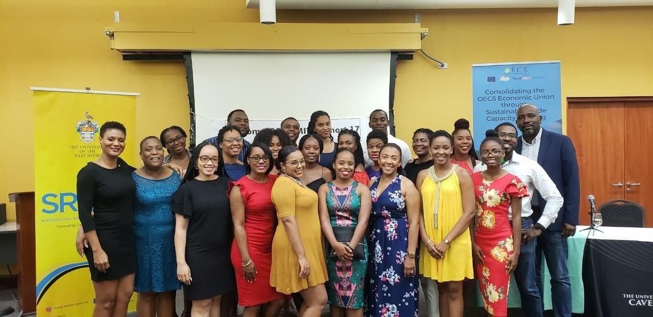 Students of the new OECS-MITP with two staff members of the OECS Commission, Ms. Shameilla Moses and Mr. Winsbert Louison, at extreme left and back right of students, respectively.