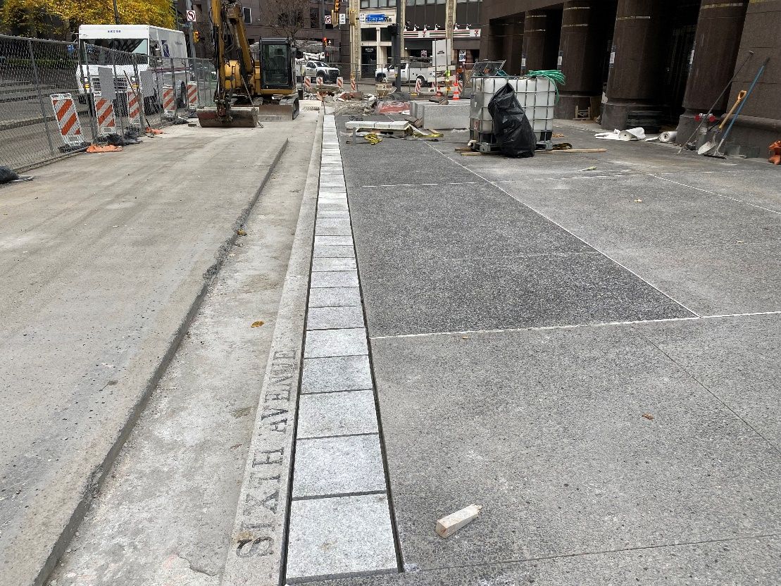 New concrete sidewalk recently placed at Wood Street Station