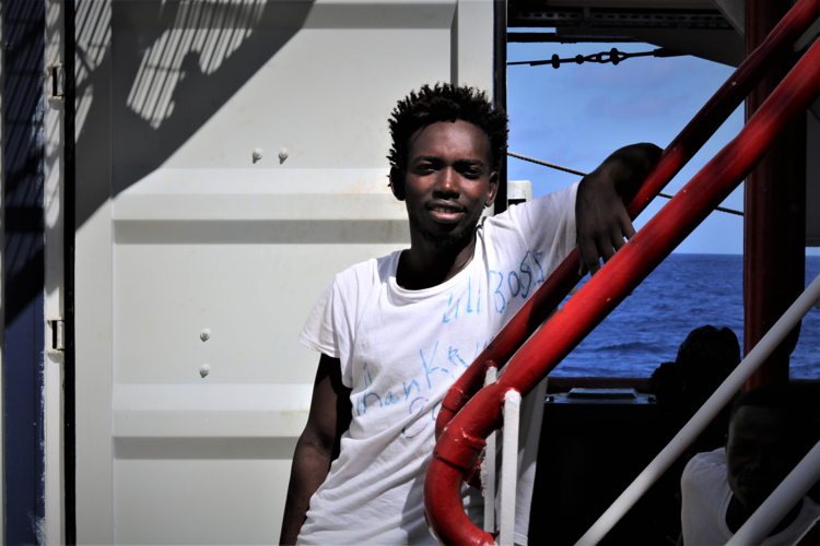 Anas Mohammed is 20 years old, from Sudan. He was on the second boat that MSF rescued. He had been in Tripoli for a year before that. 

This was the second time he had tried to cross. They tried to put in him Tajoura after the Libyan Coast Guard intercepted him, but he escaped from the car. 

He said he didn’t want to go there because he knew there was “a war inside there”. 

When an MSF staff member asked him if he had something particular he wanted to say or share, what he said was this: “Please help me. Help the people who are there. What is happening in Libya is a tragedy.”
Copyright: Hannah Wallace Bowman/MSF