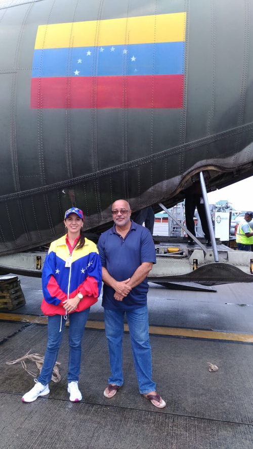 OECS Director General, Dr. Didacus Jules and Venezuela's Ambassador H.E Leiff Escalona stand in the shade of National Bolivarian Armed Forces C-130 as it prepares to leave for Dominica.