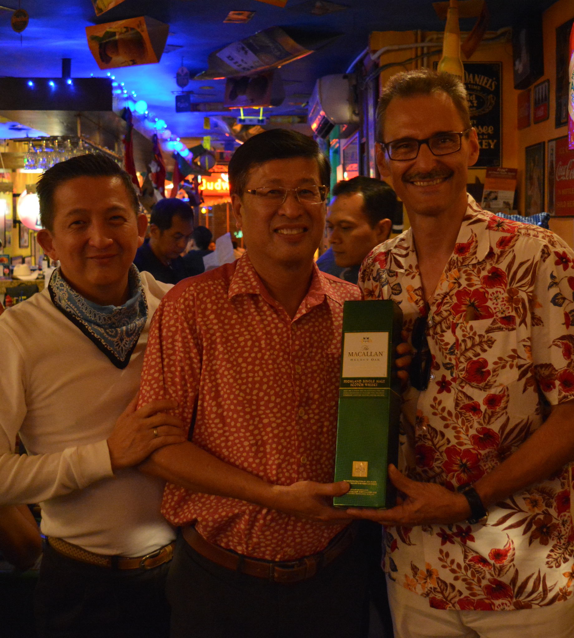 Heen Kiong Soong (centre) enjoying his celebration