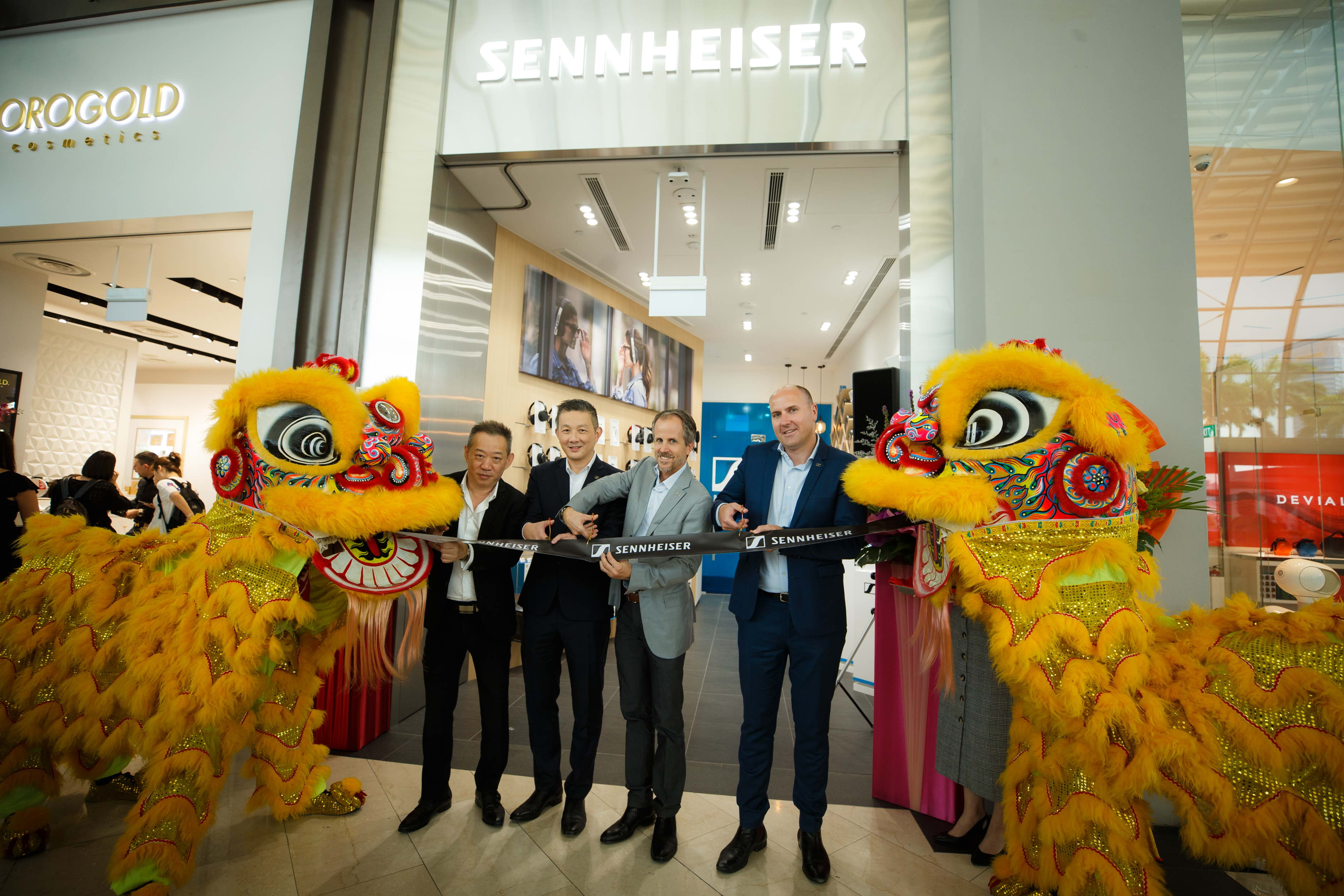 Chris Low, Martin Low, Andreas Sennheiser and Marek Jaworski ceremoniously cut the ribbon Chris Low, Martin Low, Andreas Sennheiser and Marek Jaworski ceremoniously cut the ribbon