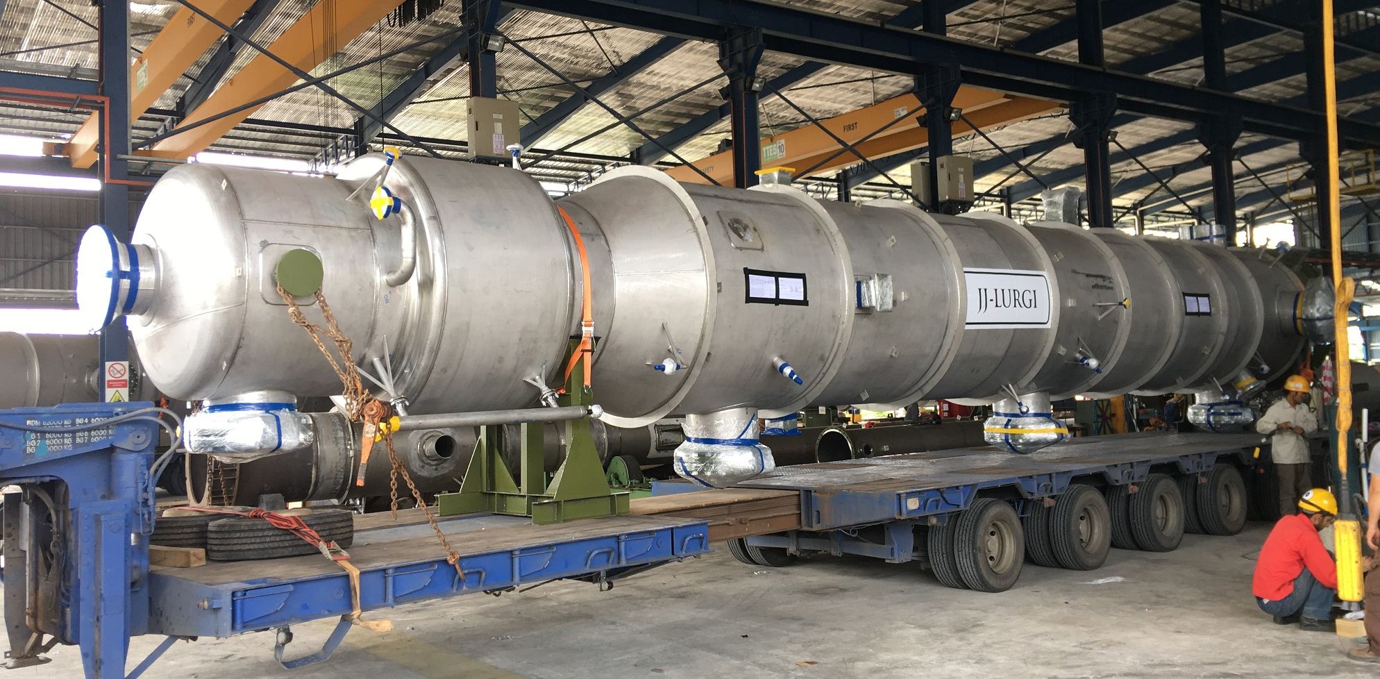Marking the successful delivery of the distillation column. Marking the successful delivery of the distillation column.
