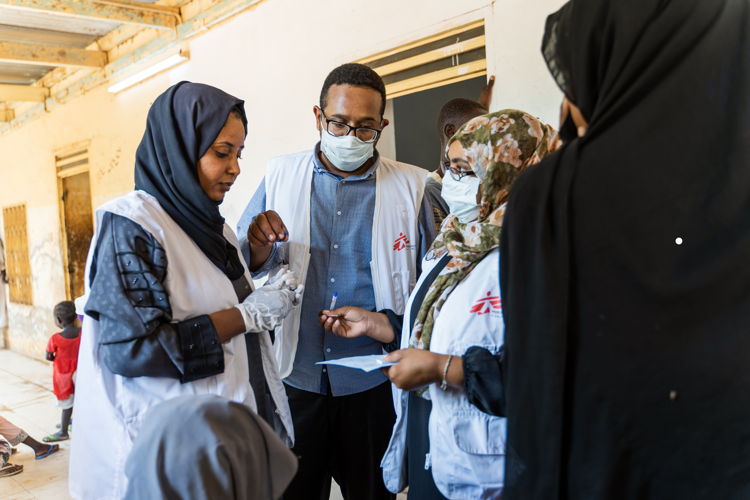 MSF staff, Dr Ahmed Omer Aljack, Eman and Makka are among the main staff running the clinic assisted by MOH staff. Copyright - Ala Kheir