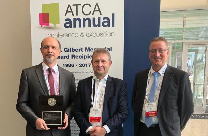 FABEC's Johan Decuyper (in the middle) receives prestigious ATCA award in US