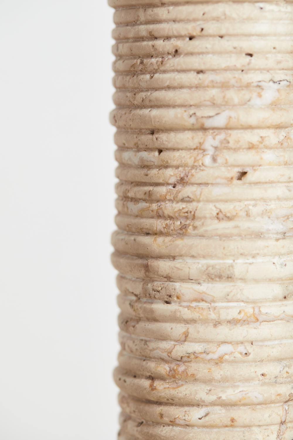 Ribbed Large Candle Holder - Travertine, $350 by Kelly Wearstler I www.kellywearstler.com (Image credit: Mark Durling)