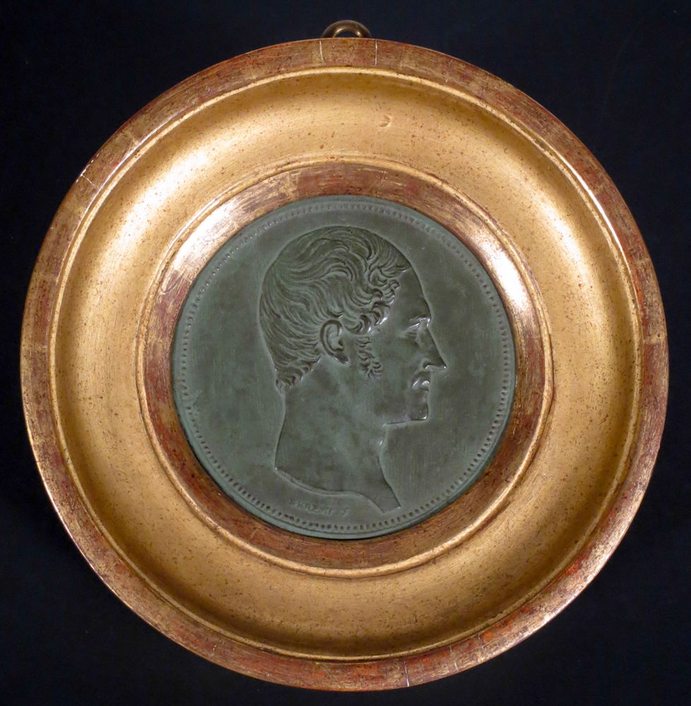 Cet exemplaire en métal de couleur bronze date de 1848 et était à l’effigie du roi des Belges de l’époque, Léopold 1er.