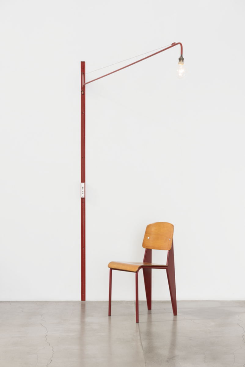Swing-jib lamp, ca. 1951 and Metrolpole no.305 chair, ca. 1950 by Jean Prouvé from Galerie Patrick Seguin at Design Miami Basel 2024 (Image courtesy of Galerie Patrick Seguin)